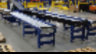 mdr-conveyor-systems-trew.png Three MDR conveyors lined up in a warehouse operation