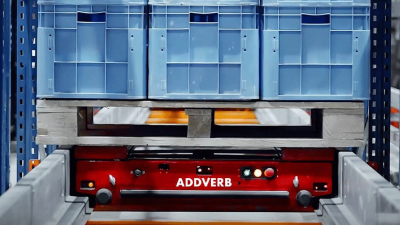 pallet-shuttle-cruiser-with-pallets-addverb.png Pallet shuttle sits inside racking system ready to put away palletized goods